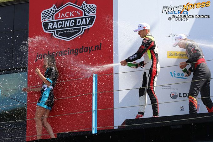Grid girl and champagne shower, soking wet